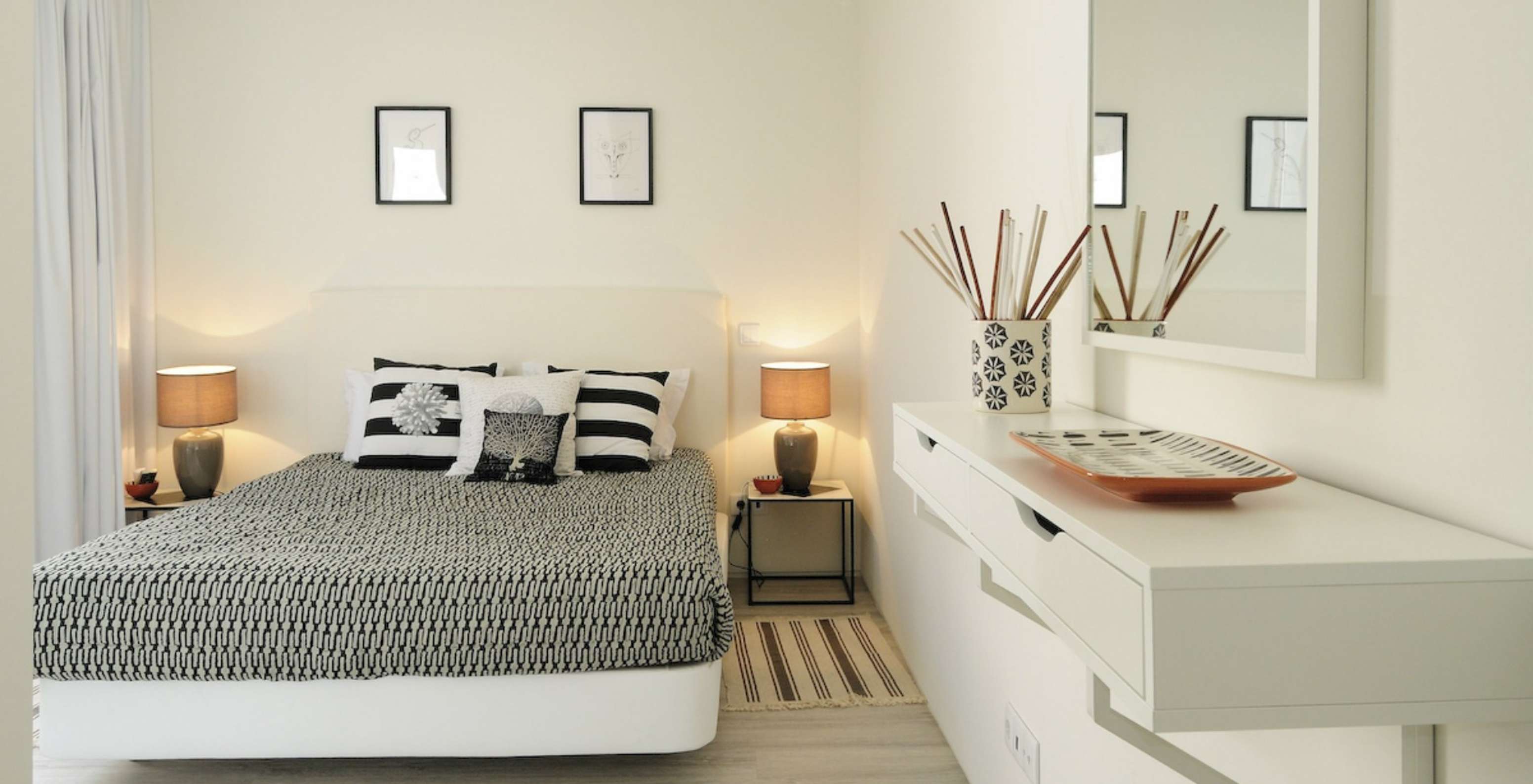 Villen mit 3 Schlafzimmern Pestana Tróia Eco Resort hat ein Doppelbett mit Nachttischen