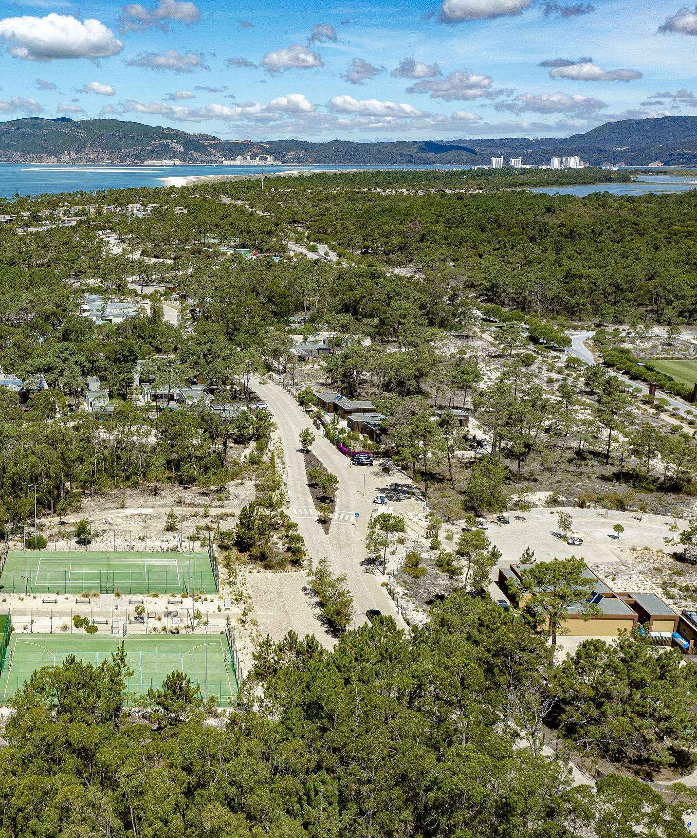 Aerial view of the sports fields available at Pestana Tróia Eco Resort, from tennis courts to soccer fields