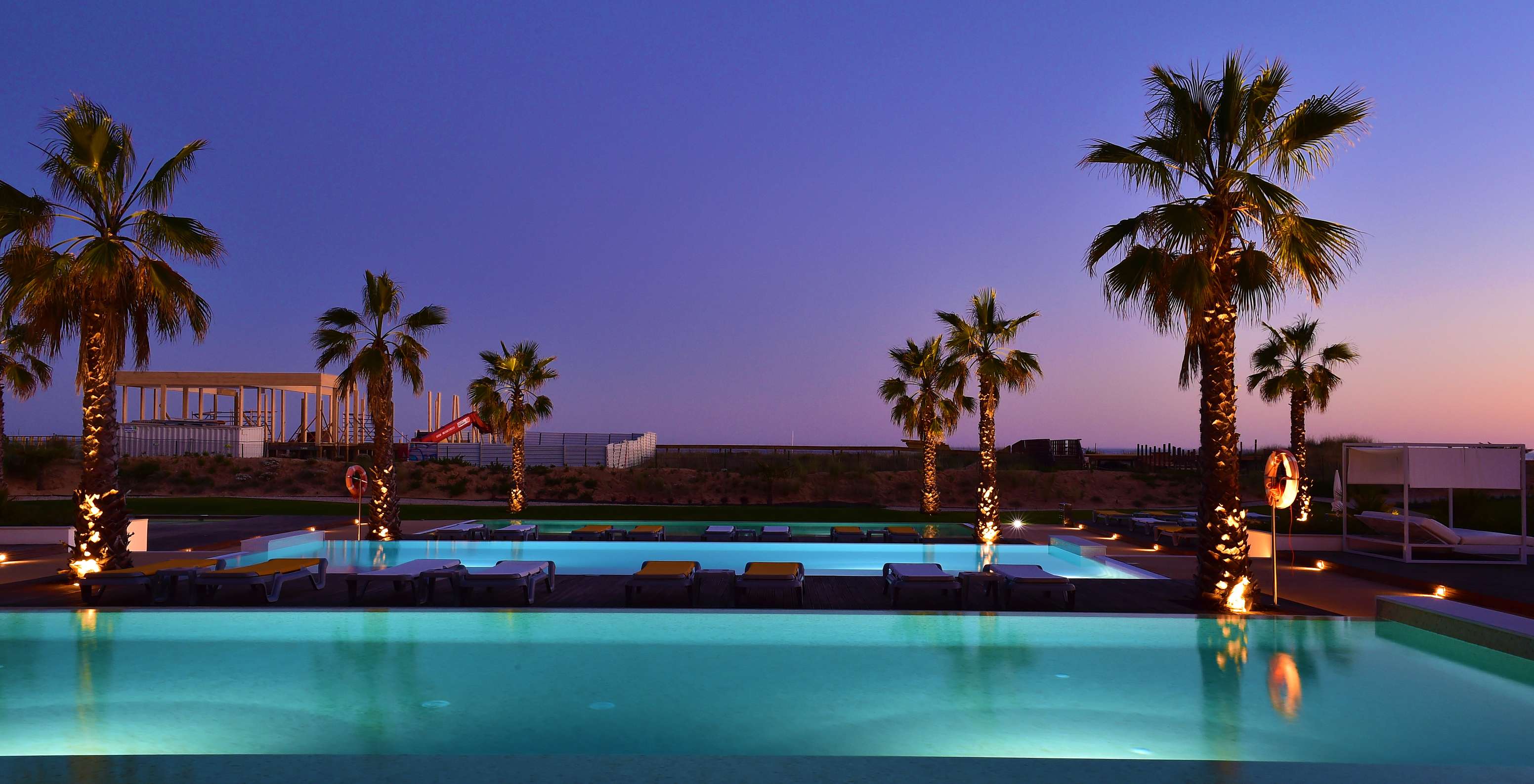 At sunset, enjoy an incredible view of the beach with blue and orange tones in the sky