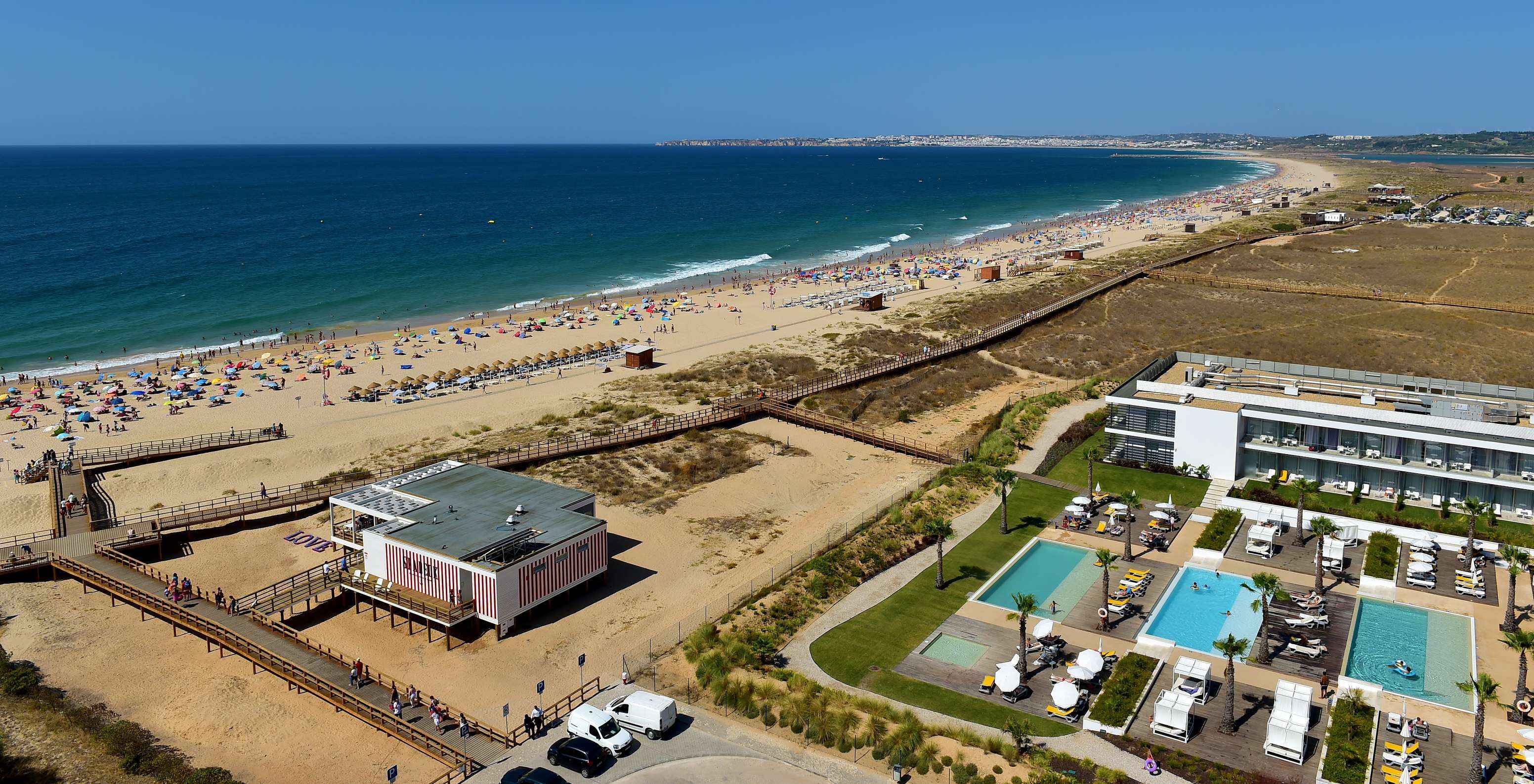 Aerial view of Pestana Alvor South Beach, Sea Deck beach restaurant, boardwalk to beach