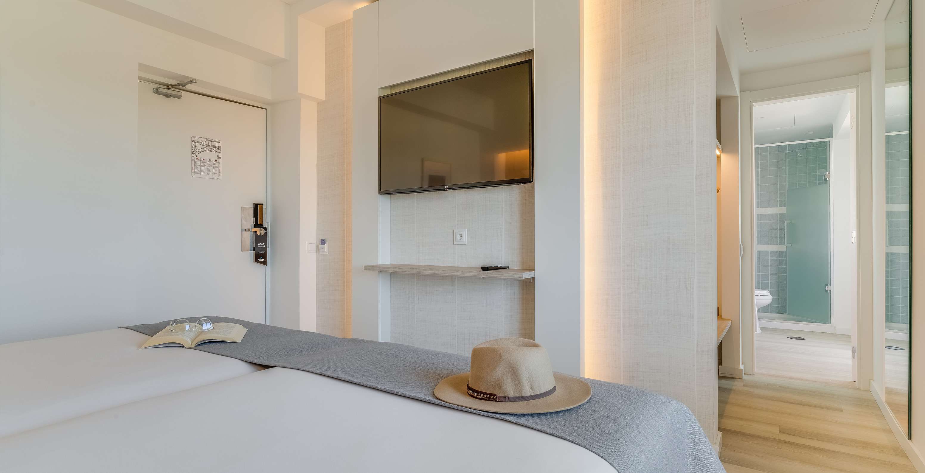 The Classic Garden View Room at Pestana Blue Alvor Beach has two single beds and a TV in front of the bed