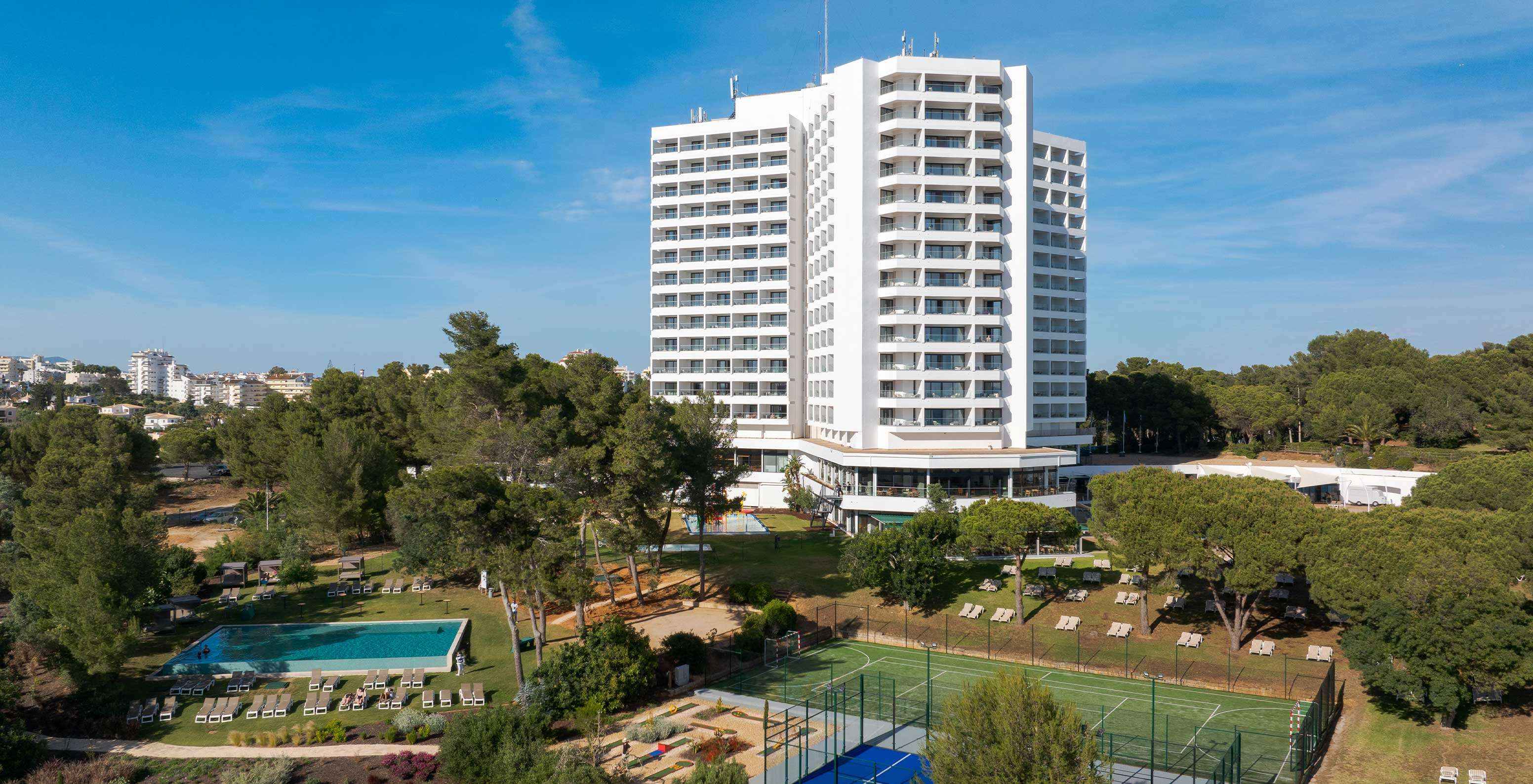 Pestana Blue Alvor Beach hotel exterior, all-inclusive Algarve hotel with pool, multi-use field