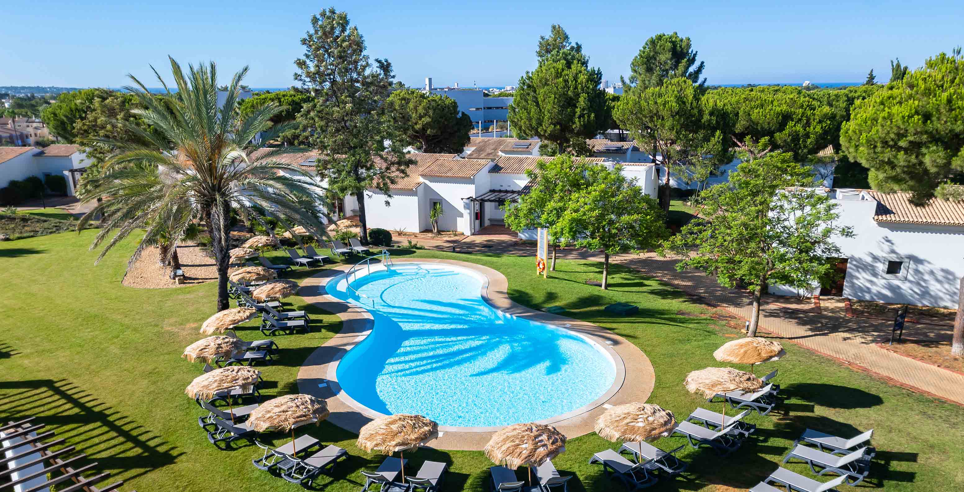View of the pool from the villas at Pestana Vila Sol - Vilamoura, a hotel with golf and spa in the Algarve