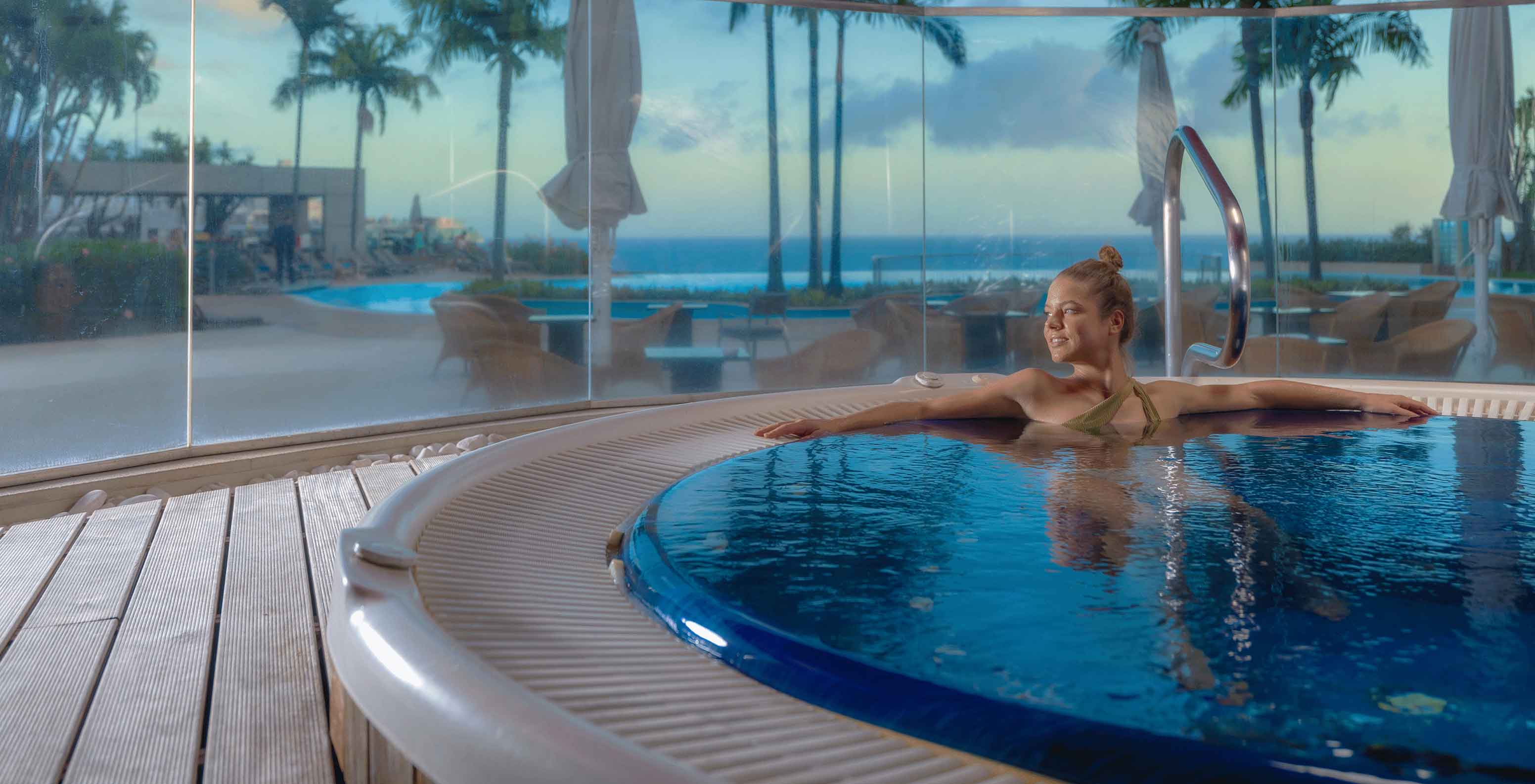 Jacuzzi with view of the outdoor pool at Pestana Casino Park, hotel in Funchal by the sea, with spa and pool