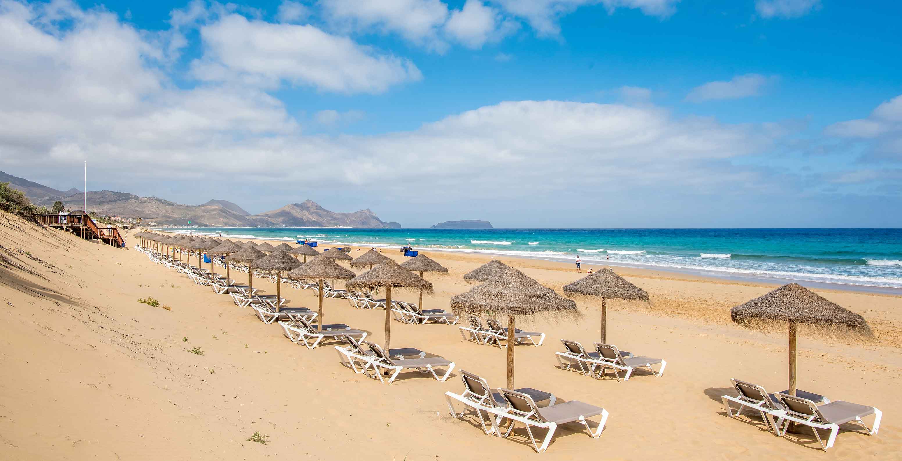 Beach Bar, 5-star Resort in Porto Santo has a beach with calm, blue sea and various awnings