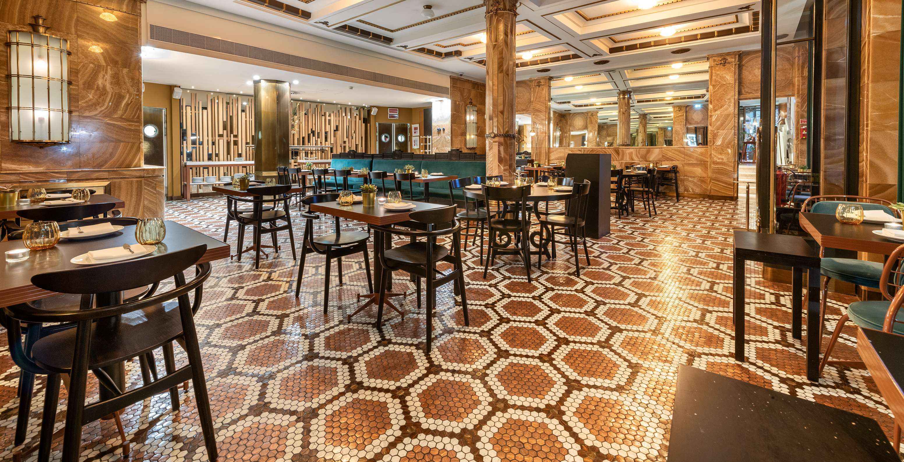 The A Brasileira restaurant at the 5-Star Hotel in central Porto features modern and elegant decor