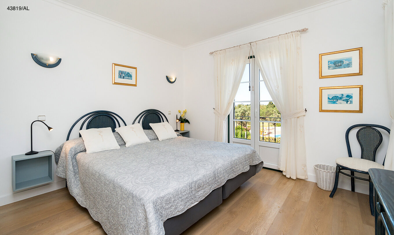 The Pestana Carvoeiro Golf T1 Superior Apartment has a double bed with two nightstands