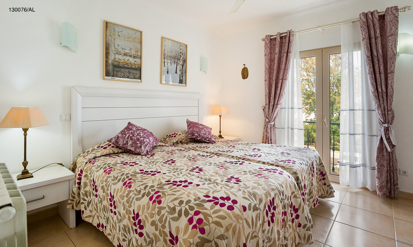 The Pestana Carvoeiro Golf T2 Standard Apartment has a double bed with two nightstands