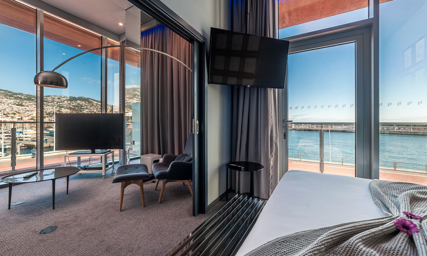 The CR7 Suite at Pestana CR7 Funchal offers a near-panoramic view of Funchal from near the television