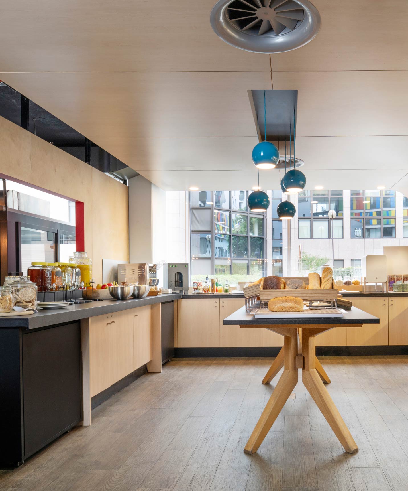 Zona de desayuno en Pestana Brussels Schuman, hotel en Bruselas cerca del Parlamento Europeo