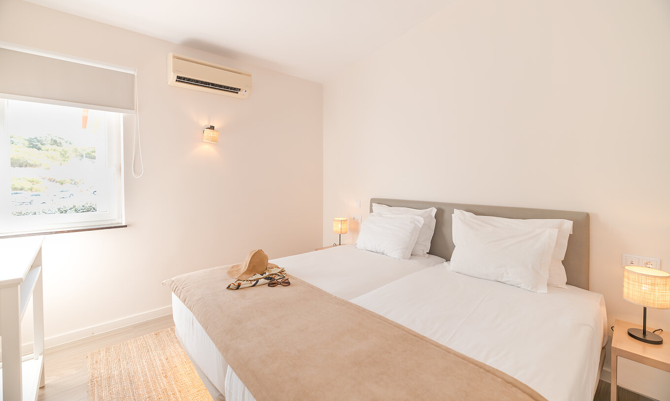 Villa 1 Chambre Vue Jardin au Pestana Alvor Beach Villas dispose d'un lit double, climatisation et fenêtre