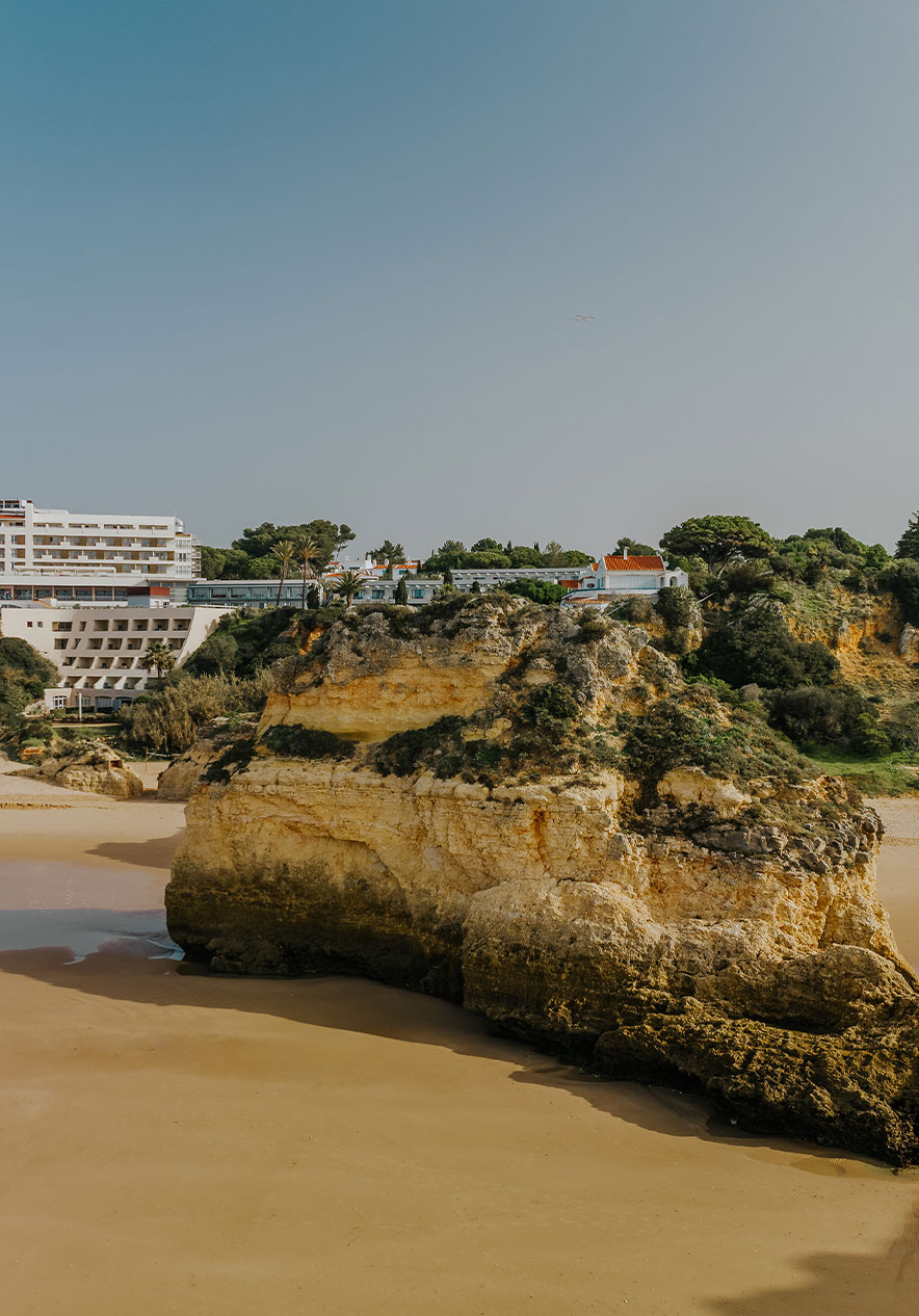 Visit Alvor beach known for its golden sand and rocks the perfect spot to relax and enjoy the sun