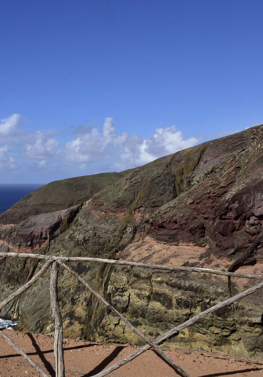 Paths on Porto Santo island in the midst of nature with land elevations by the sea