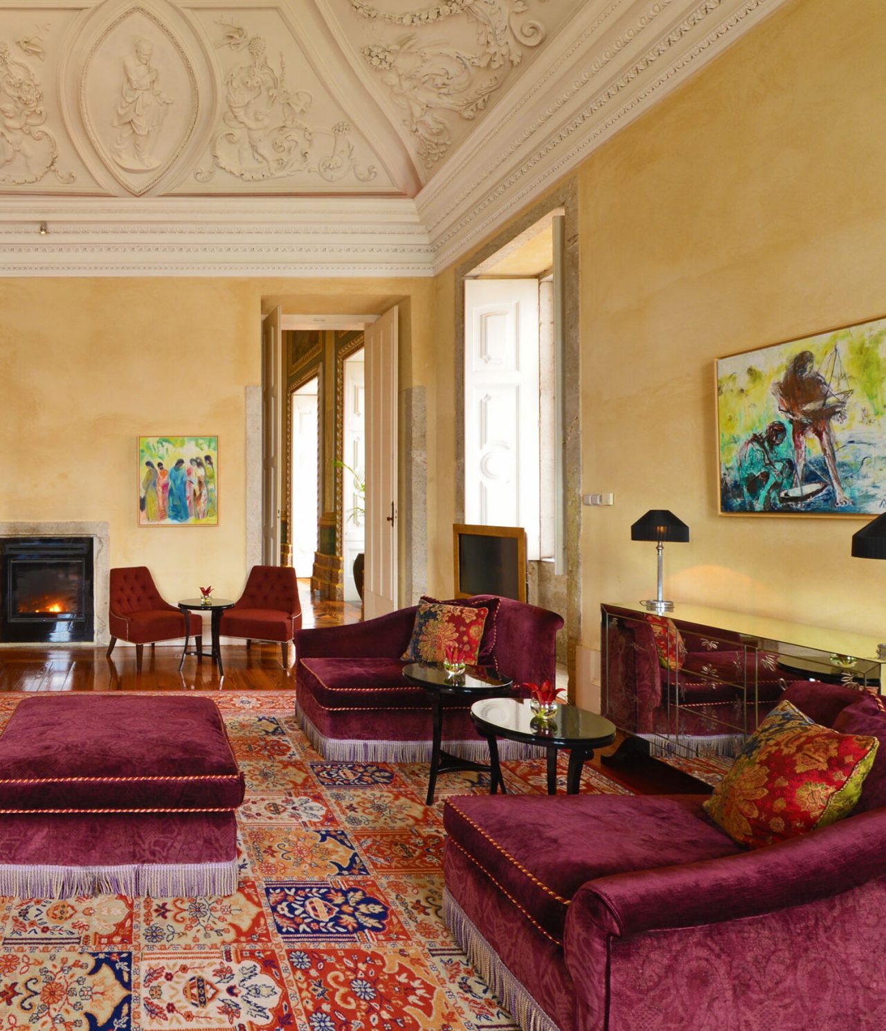 Nasoni Bar, 5-Star National Monument Hotel in Porto, luxurious decor with red velvet sofas