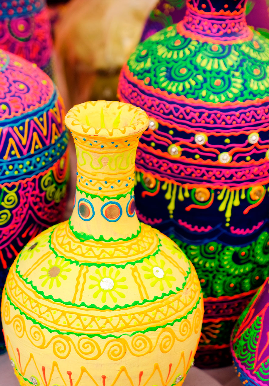 Busy market in Buenos Aires with colorful jars and local products